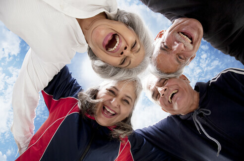 two healthy, happy senior couples