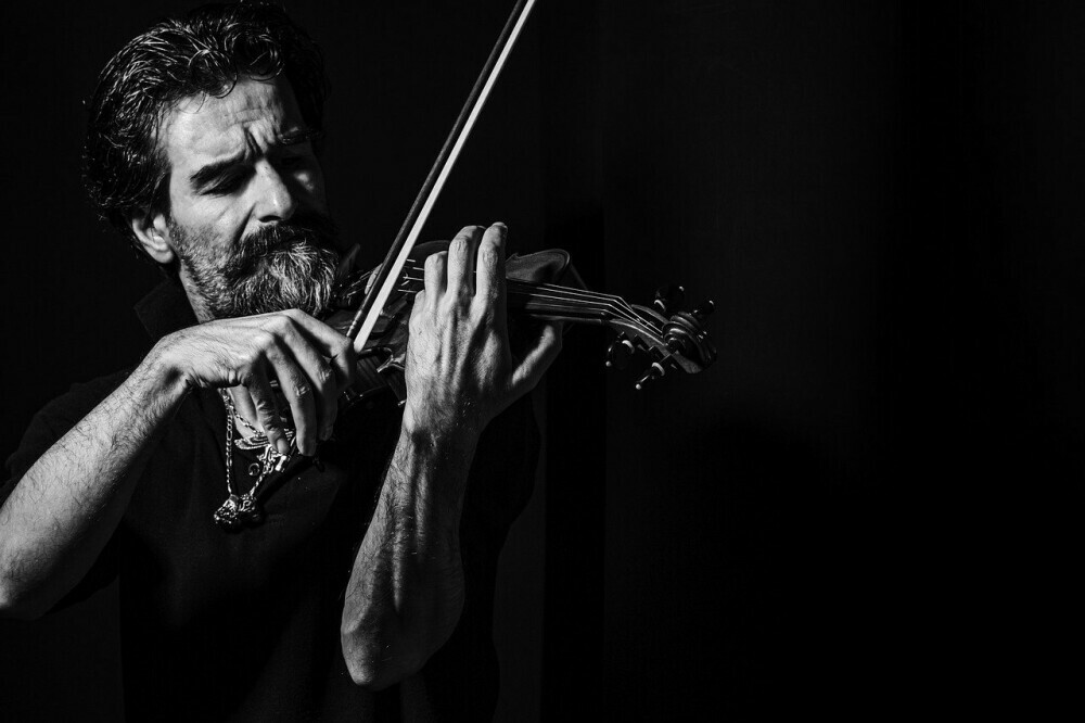 man playing violin